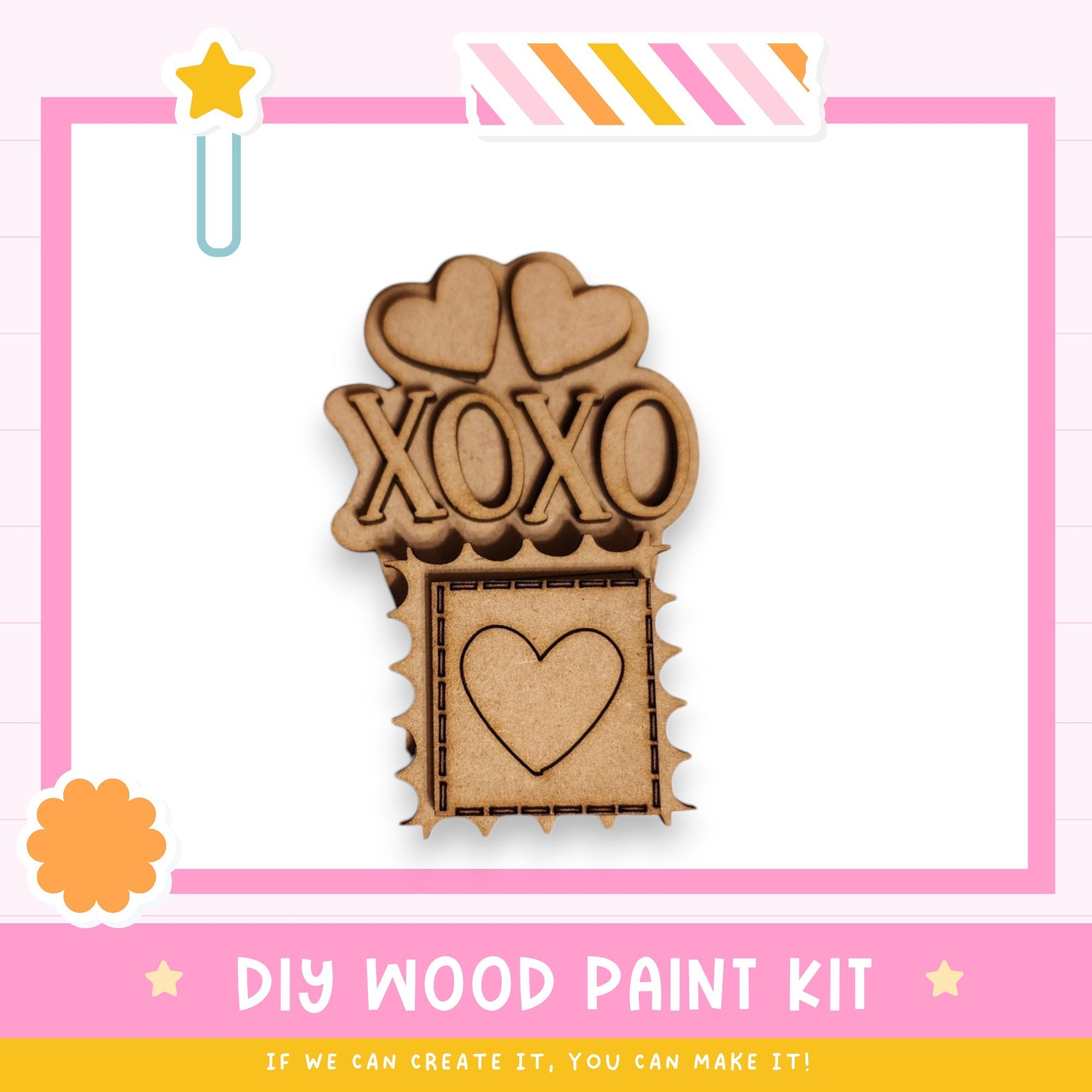 a DIY wood paint kit with a heart-shaped cutout and the word "XOXO" written on it, set against a pink and white background.