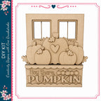 The image is a wooden carving of a pumpkin with the text "Hey there, PUMPKIN" carved into it.