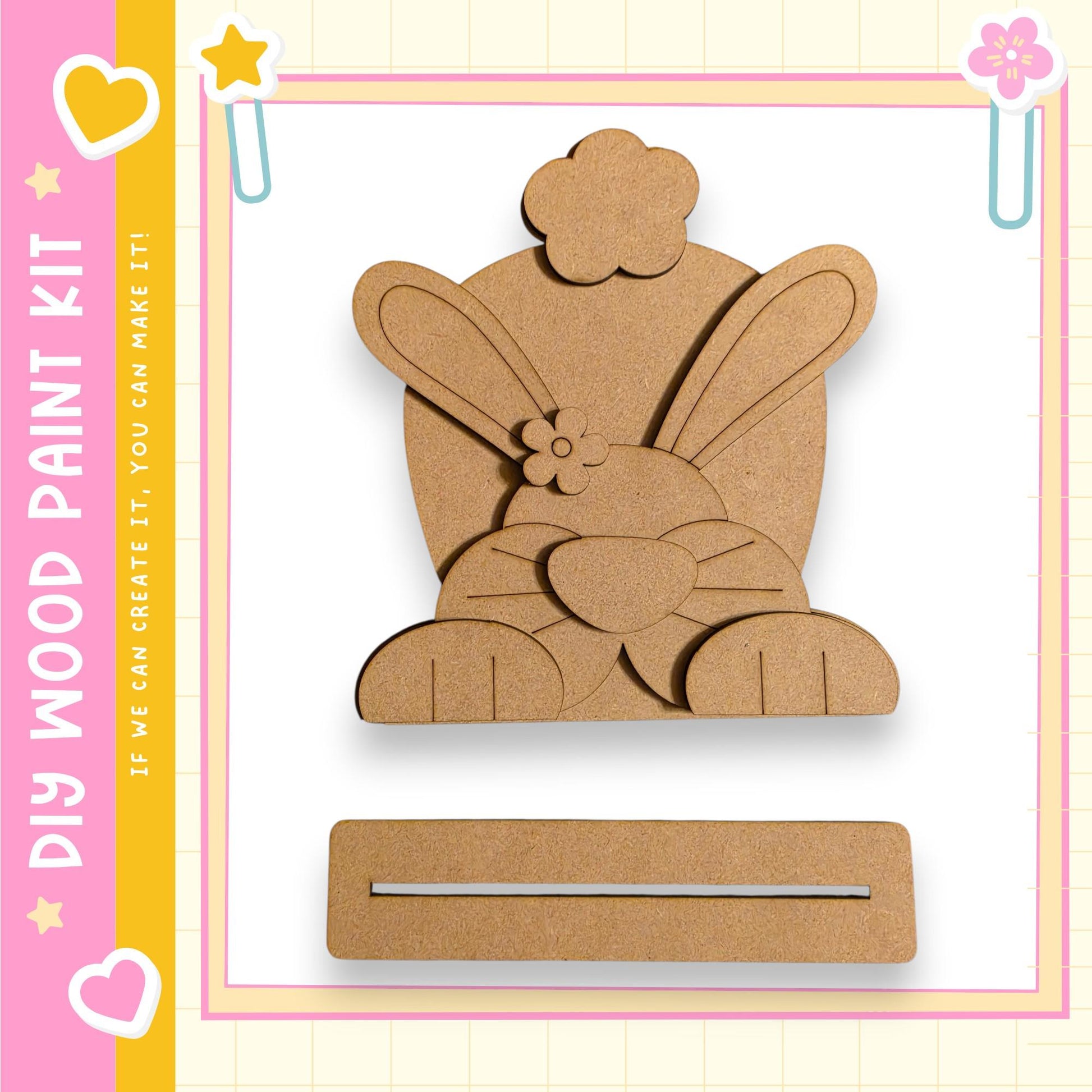 a wooden paint kit with a cute bunny design, including a wooden frame and a wooden stick.