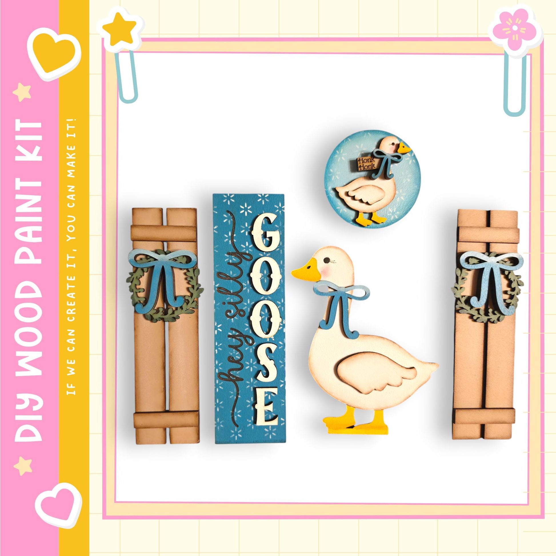 a wooden paint kit with various wooden elements, including a wooden shutter, a wooden sign, and a wooden goose.