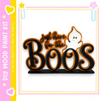 A Halloween-themed sign with the text "Just here for the BOOs" and a ghost character.