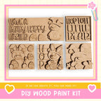 a set of four wooden stamps with the words happy birthday written on them