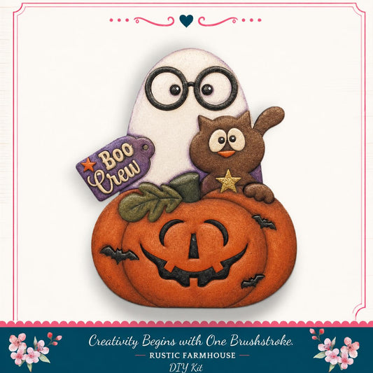 A Halloween-themed DIY kit featuring a ghost, a cat, and a carved pumpkin.