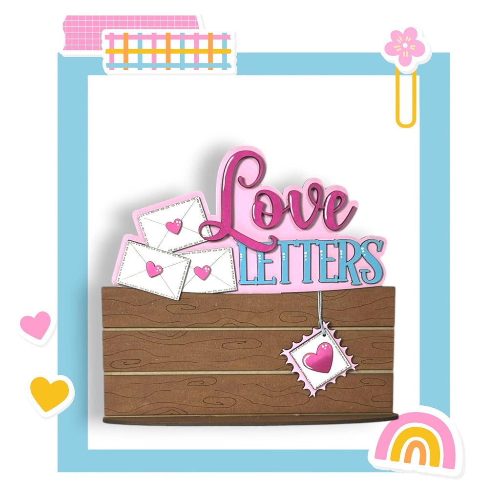 a wooden sign that says love letters on it