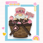 a card with a basket of chocolates and a gnome