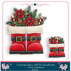 A DIY kit for creating a Christmas-themed decoration, featuring a pair of red Santa boots with a floral arrangement inside.