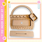 a wooden paint kit, including a handle and a drawer, designed for creating a handbag or purse.