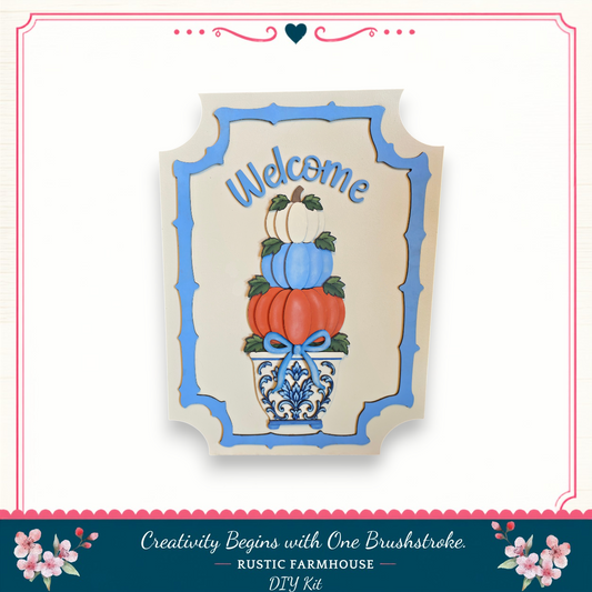 a welcome sign with a decorative design, including a vase with pumpkins and leaves, and the text "Welcome" written on it.