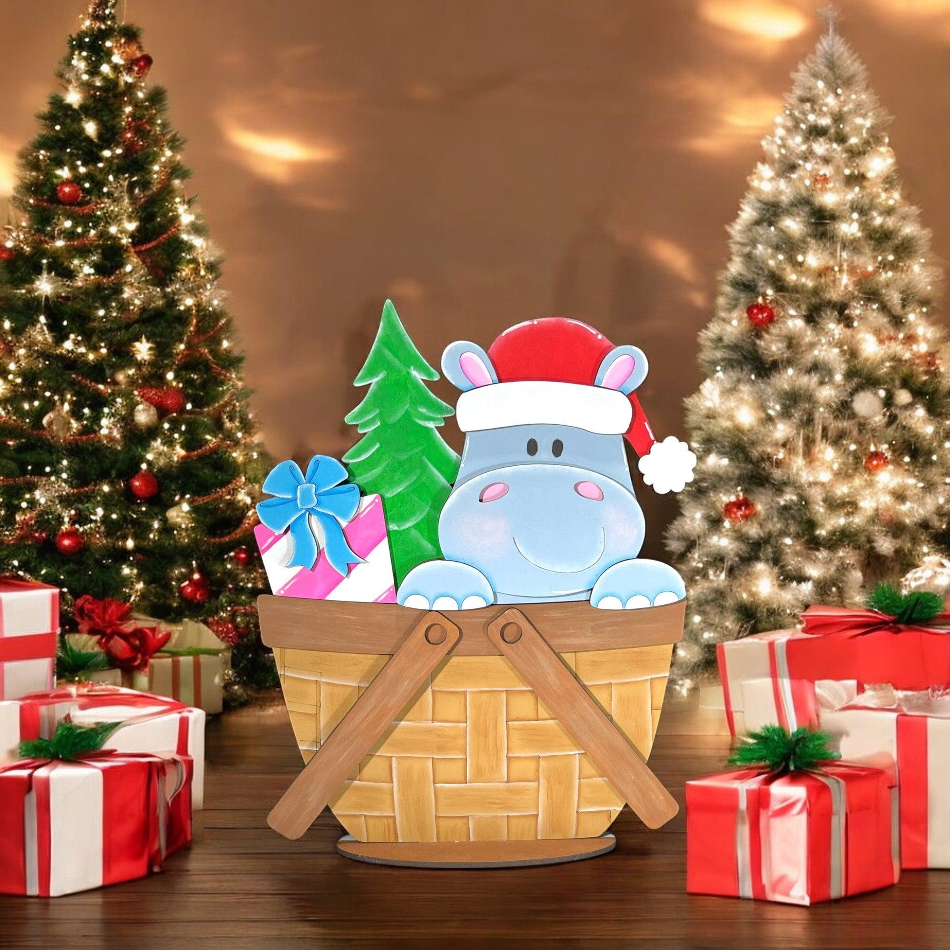 a christmas scene with presents and a hippo in a basket