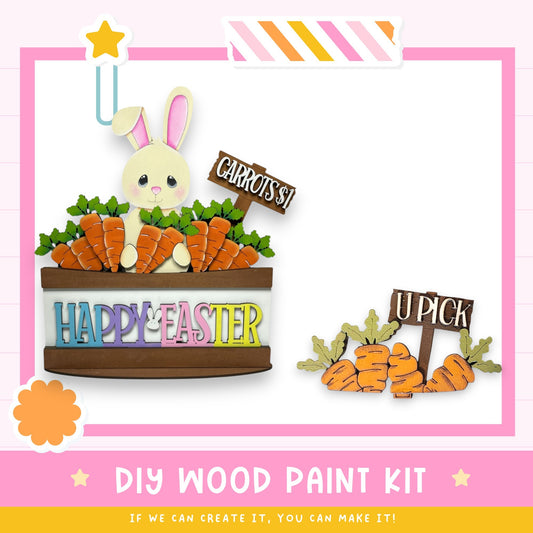 The image is a colorful Easter-themed collage featuring a wooden bunny holding a basket of carrots, with signs indicating the names of the carrots. The collage includes a "Happy Easter" sign, a "CARROTS" sign, and a "U PICK" sign. The image also includes a DIY wood paint kit and a message encouraging creativity.