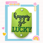a green plaque that says happy go lucky