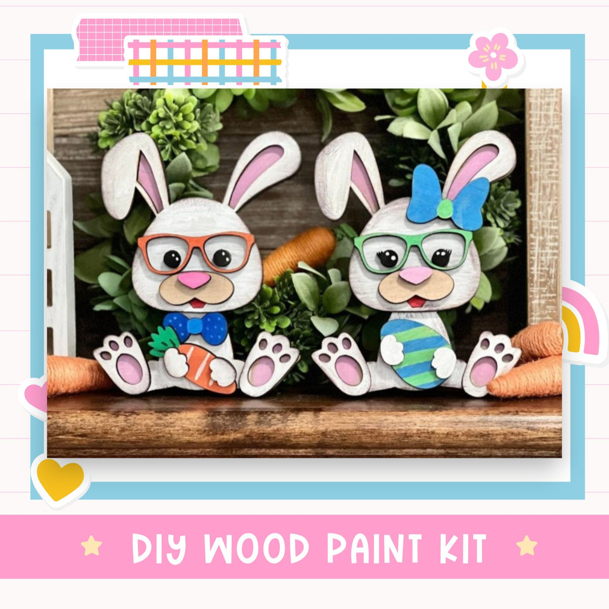 two white rabbits wearing glasses and holding carrots, sitting on a wooden surface. The rabbits are surrounded by a wreath of greenery and a rainbow-colored flower. The image also includes text that reads "DIY WOOD PAINT KIT" and "Easter Bunny".