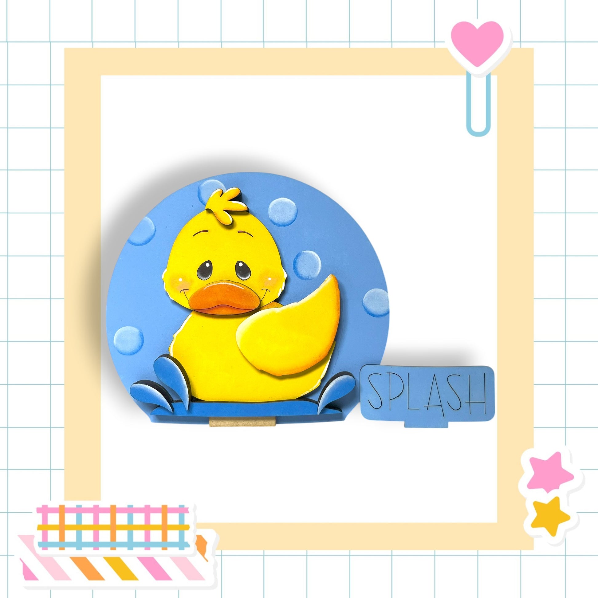 A yellow duck with a blue background and bubbles, surrounded by a yellow border and various colorful stickers.