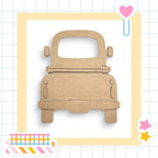 a cardboard cutout of a small car