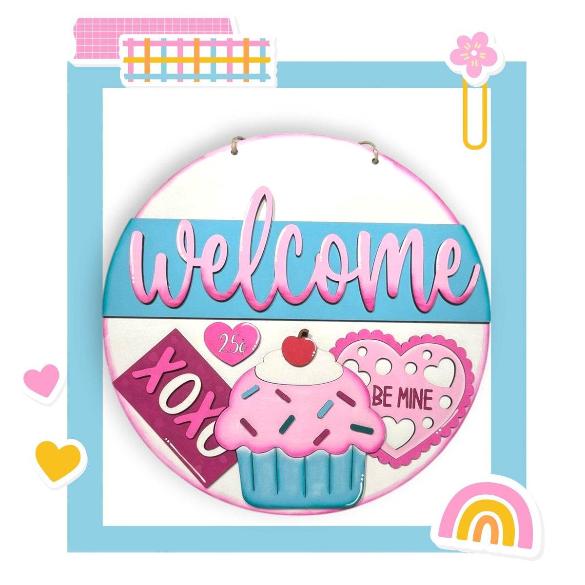 a picture of a welcome sign with a cupcake
