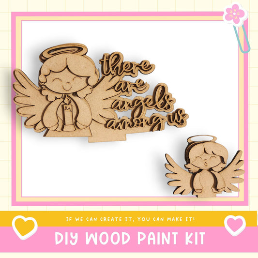a DIY wood paint kit with a wooden angel and a wooden angel figurine. The kit includes a wooden angel and a wooden angel figurine, along with a wooden angel and a wooden angel figurine. The kit also includes a wooden angel and a wooden angel figurine. The kit is designed for people to create their own wooden angels.