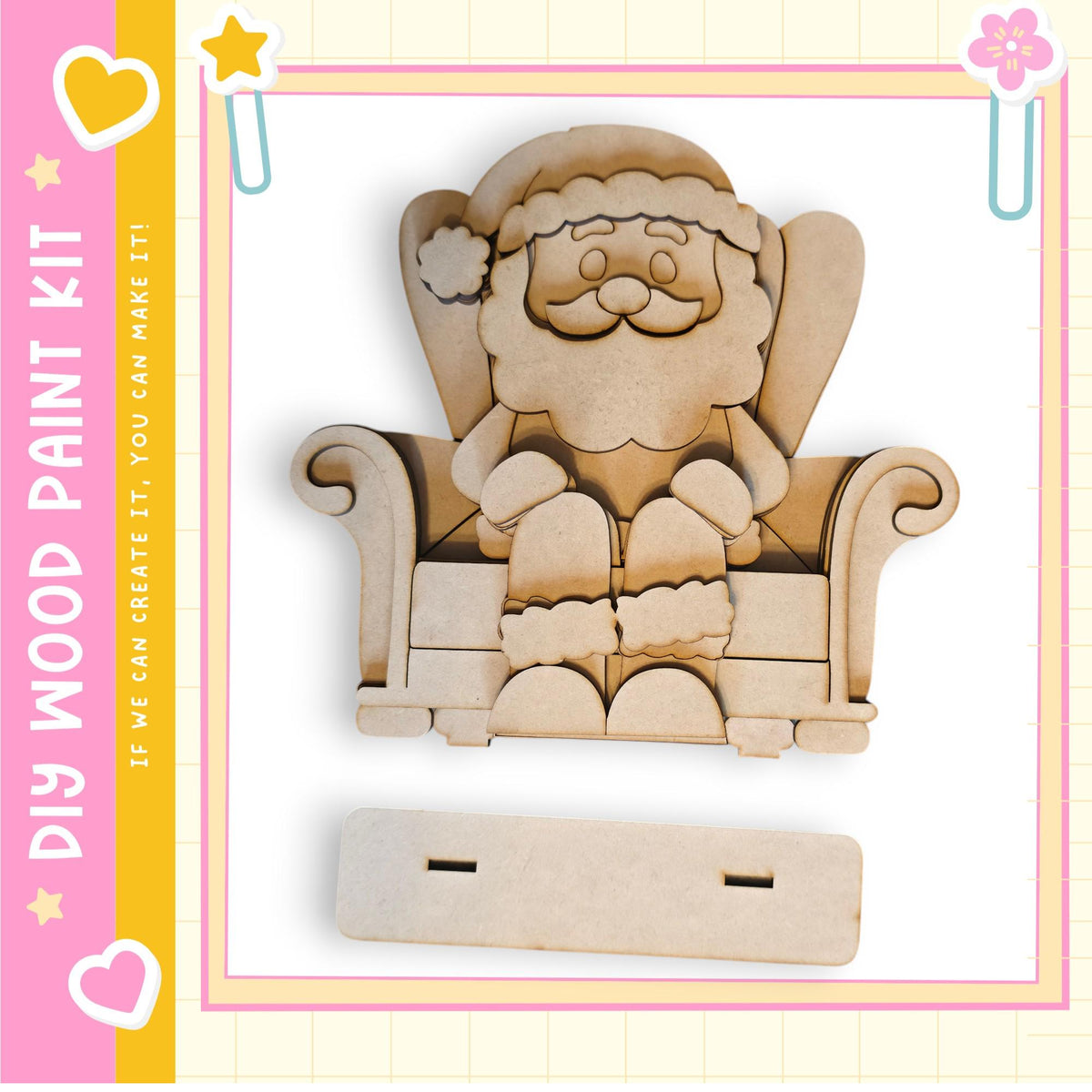 A wooden Christmas-themed decoration kit, featuring a wooden Santa Claus figure sitting in a chair.