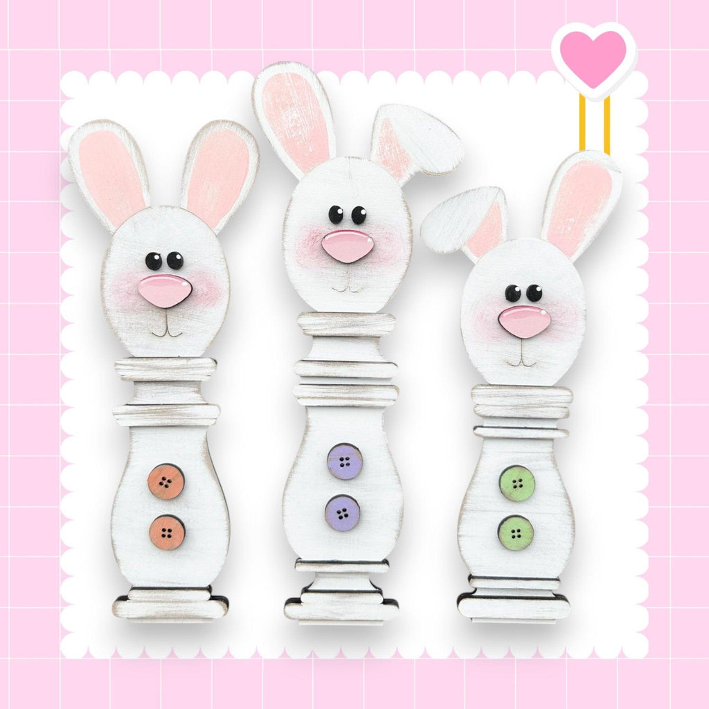 a couple of rabbits are standing next to each other
