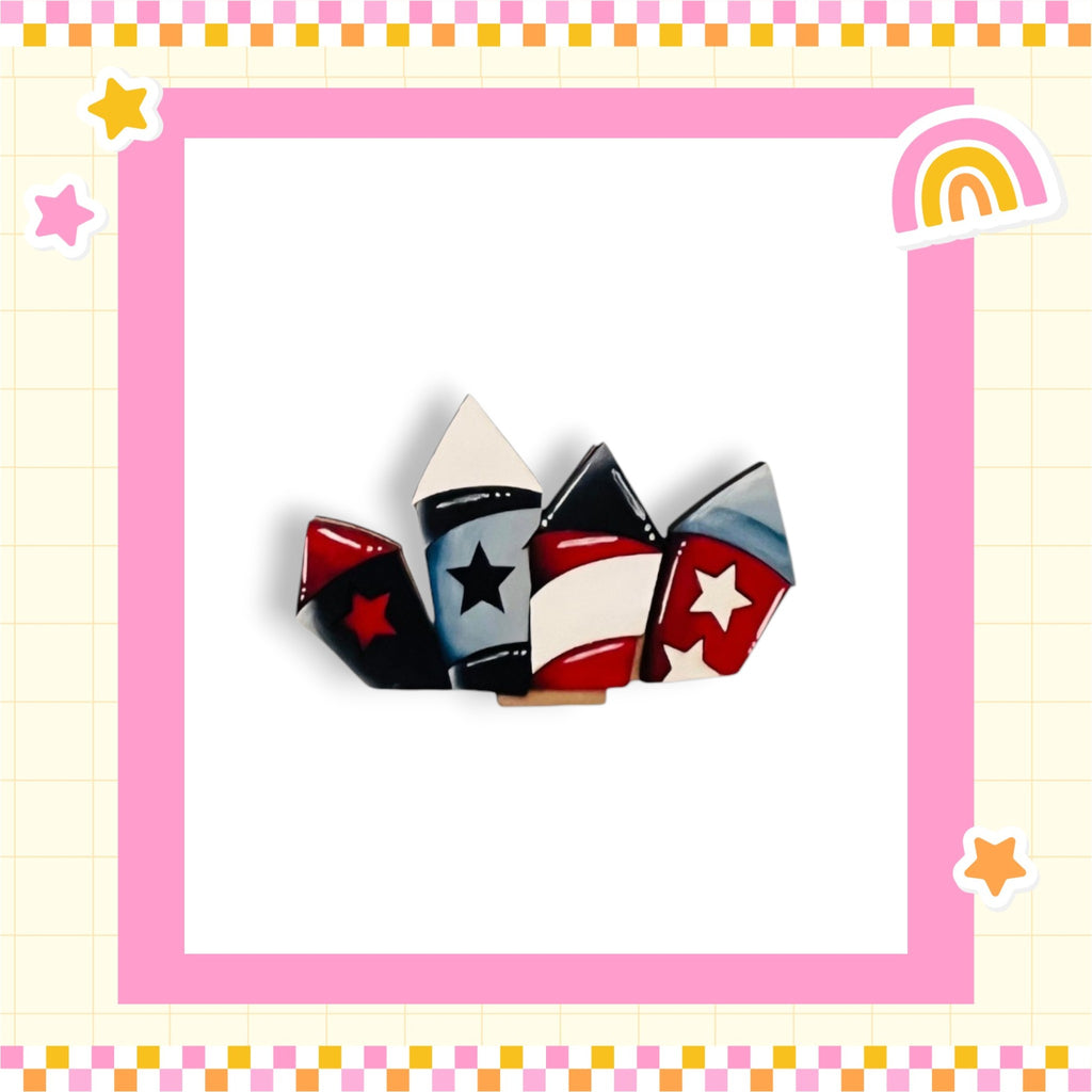 A colorful frame with a pink border surrounds a group of four colorful, star-shaped objects.