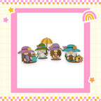 A group of four whimsical gnomes wearing colorful hats and holding umbrellas, set against a pink and yellow checkered background with stars and a rainbow.