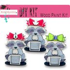 three raccoon wood paint kits with bows