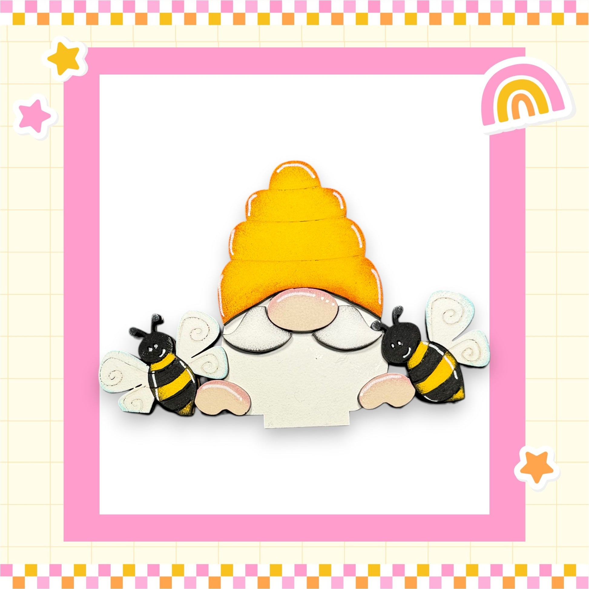 A whimsical illustration of a gnome wearing a yellow hat and holding two bees, set against a pink and yellow checkered background with stars and a rainbow.