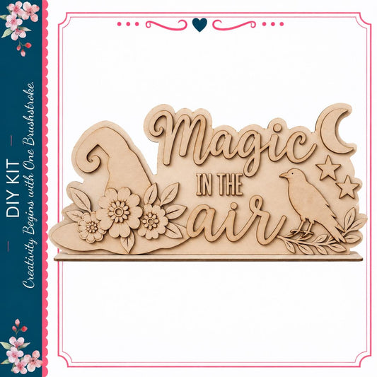a wooden sign with the text "Magic in the air" carved into it, along with a bird and flowers.