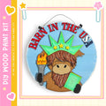 a wooden sign with a cartoon character holding a torch and a book, with the text "Barn in the USA" written on it.