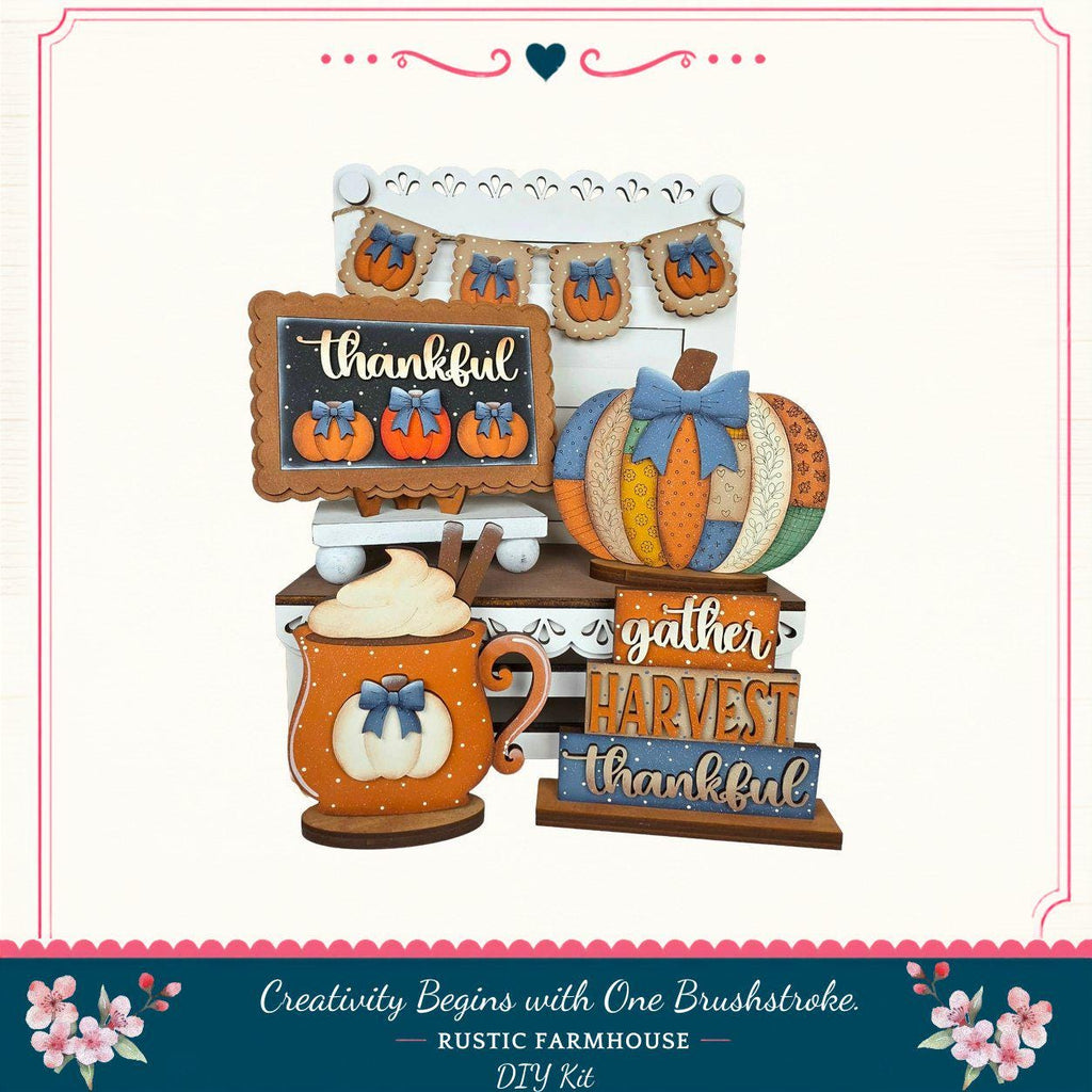 A rustic farmhouse-style DIY kit featuring a Thanksgiving-themed display with a pumpkin, a sign, and a pumpkin-shaped mug.