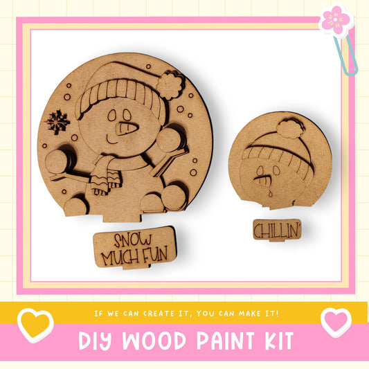 a DIY wood paint kit for creating snow-themed decorations, including a snowman and a chiller.
