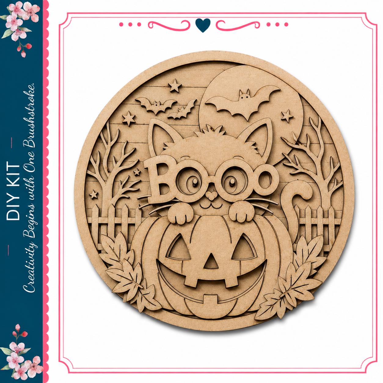 A wooden carving of a cat wearing glasses and holding a carved pumpkin, surrounded by bats, leaves, and a full moon, all set against a Halloween-themed background.