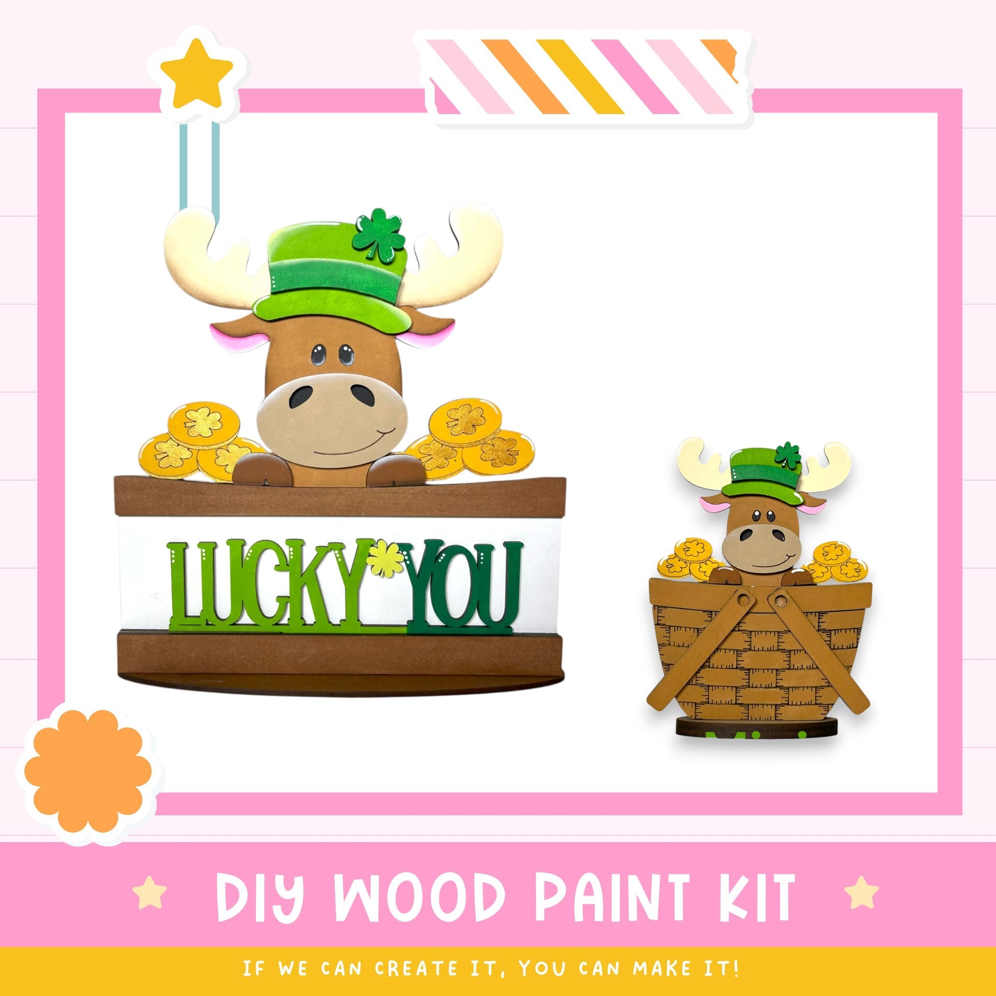 a DIY wood paint kit for creating a Lucky You sign. The kit includes a wooden sign with the word "Lucky You" and a moose figure wearing a green hat. The moose is sitting in a basket filled with gold coins, adding a festive touch to the sign. The kit is presented in a pink and white frame, and the text "DIY WOOD PAINT KIT" is displayed at the bottom.
