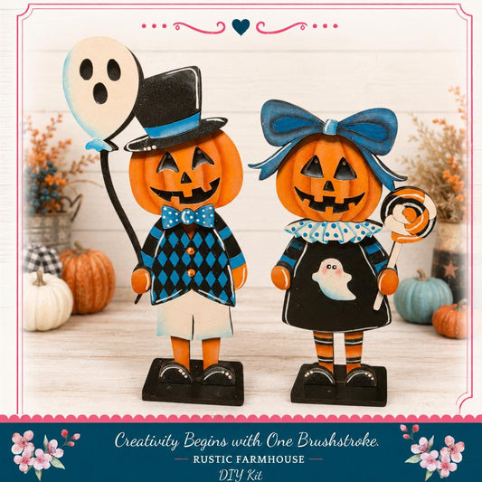 two wooden Halloween decorations, a jack-o-lantern and a ghost, standing on a wooden surface. The decorations are dressed in black and blue outfits, and they are surrounded by pumpkins and other Halloween-themed decorations.