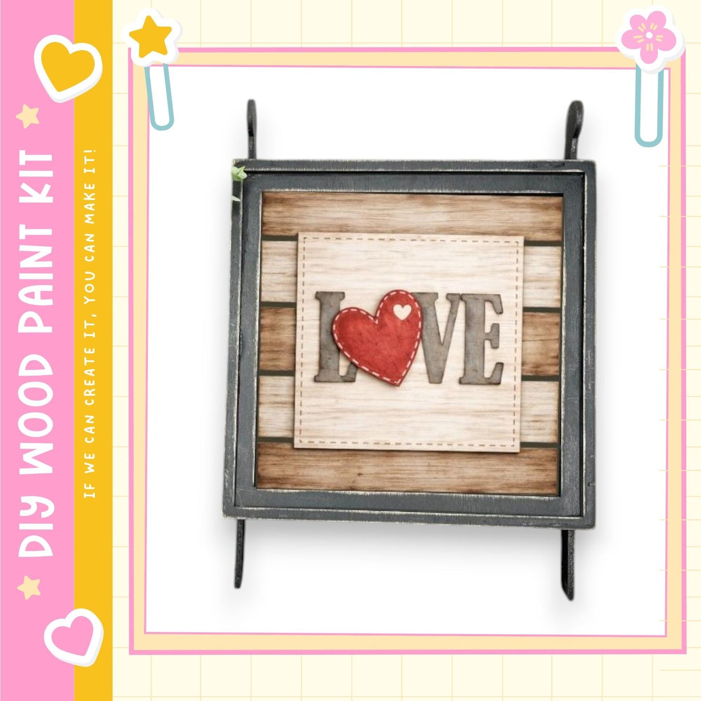 a wooden frame with the word "LOVE" written on it, along with a red heart-shaped cutout.