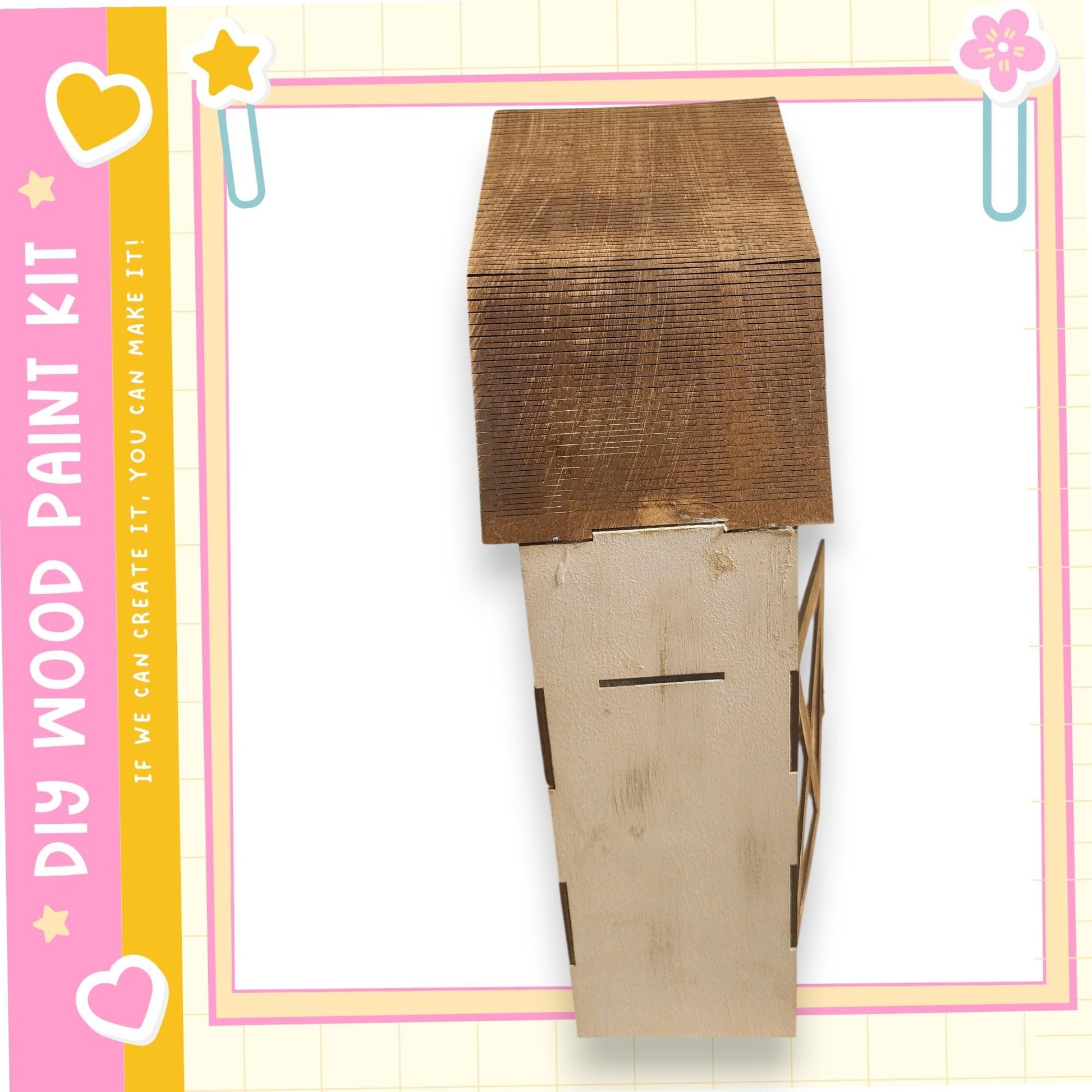 a wooden box with a lid, set against a pink and yellow background with decorative elements.