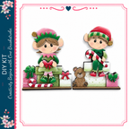 two cartoon-style elf characters, one standing and one sitting, holding candy canes and surrounded by holiday-themed decorations such as presents and a teddy bear.