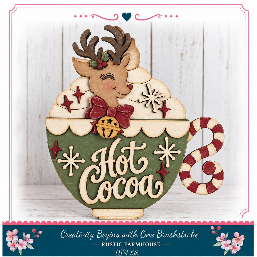 A wooden mug with a reindeer and snowflakes, along with the text "Hot Cocoa" written on it, is displayed in the image.
