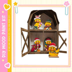 A wooden barn-shaped display case containing four small duck figurines wearing festive hats and costumes, including Santa hats and reindeer antlers.