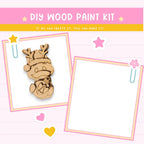 The image is a DIY wood paint kit featuring a wooden reindeer and a blank white frame.