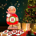 a christmas tree with presents and a teddy bear