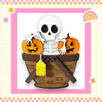 A skeleton toy is sitting in a basket filled with carved pumpkins, creating a spooky and festive Halloween scene.