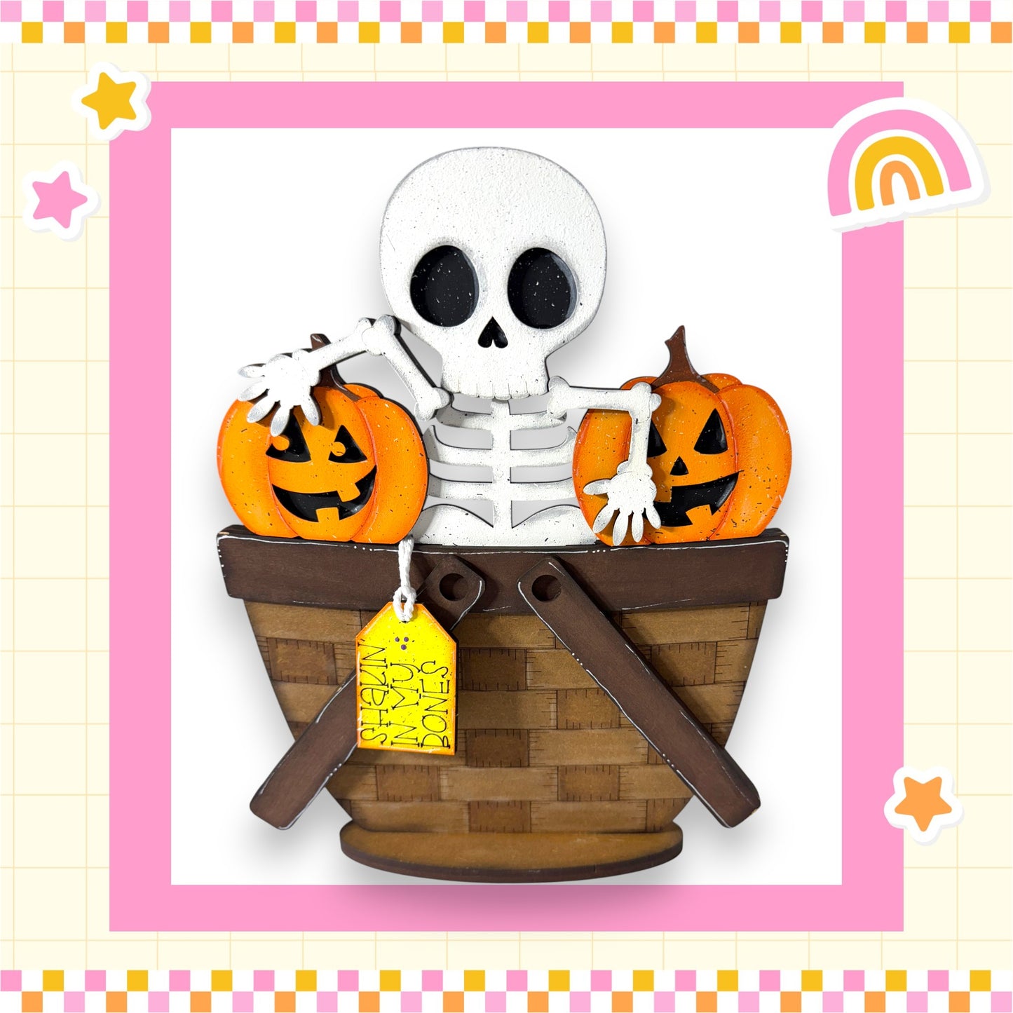A skeleton toy is sitting in a basket filled with carved pumpkins, creating a spooky and festive Halloween scene.