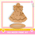 a DIY wood paint kit, including a wooden dress and a wooden stand, with a pink and white border.
