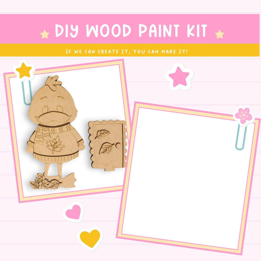 The image is a DIY wood paint kit featuring a wooden duck and a wooden book. The kit appears to be designed for children, as indicated by the playful design and the presence of a blank space for painting.