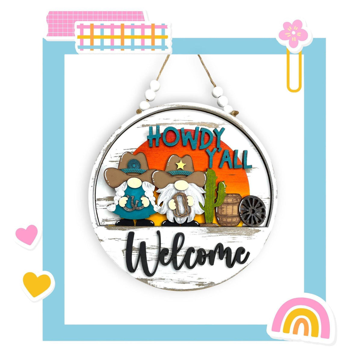 a picture of a welcome sign hanging from a wall
