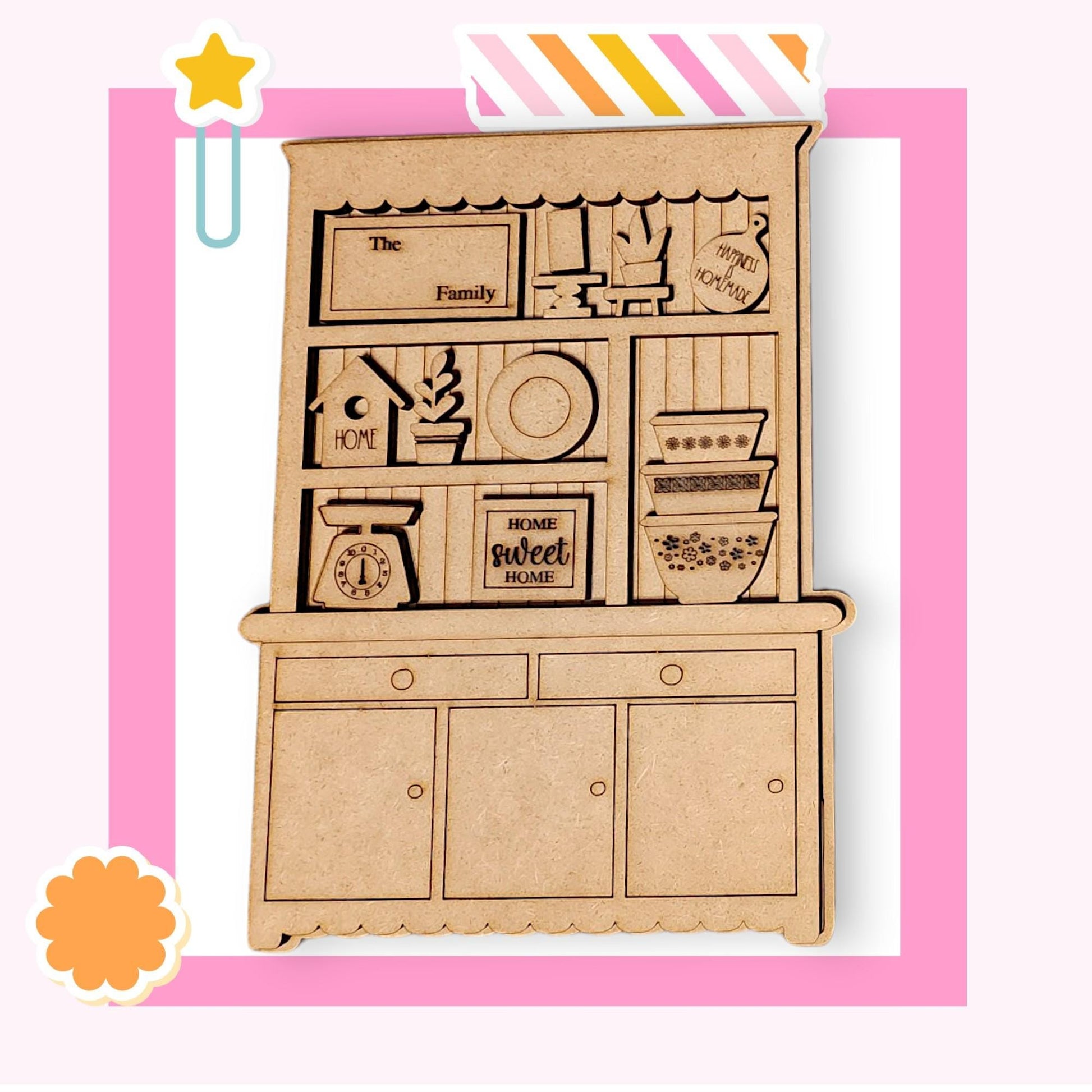 a wooden cutout of a kitchen cabinet