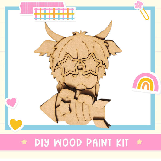 a wooden cutout of a demon with a rainbow in the background