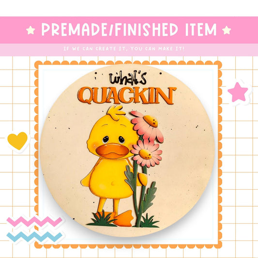 a picture of a yellow duck holding a pink flower