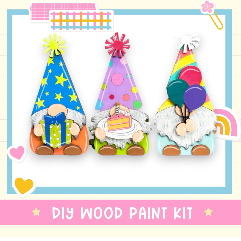 a group of three gnomes sitting on top of a table