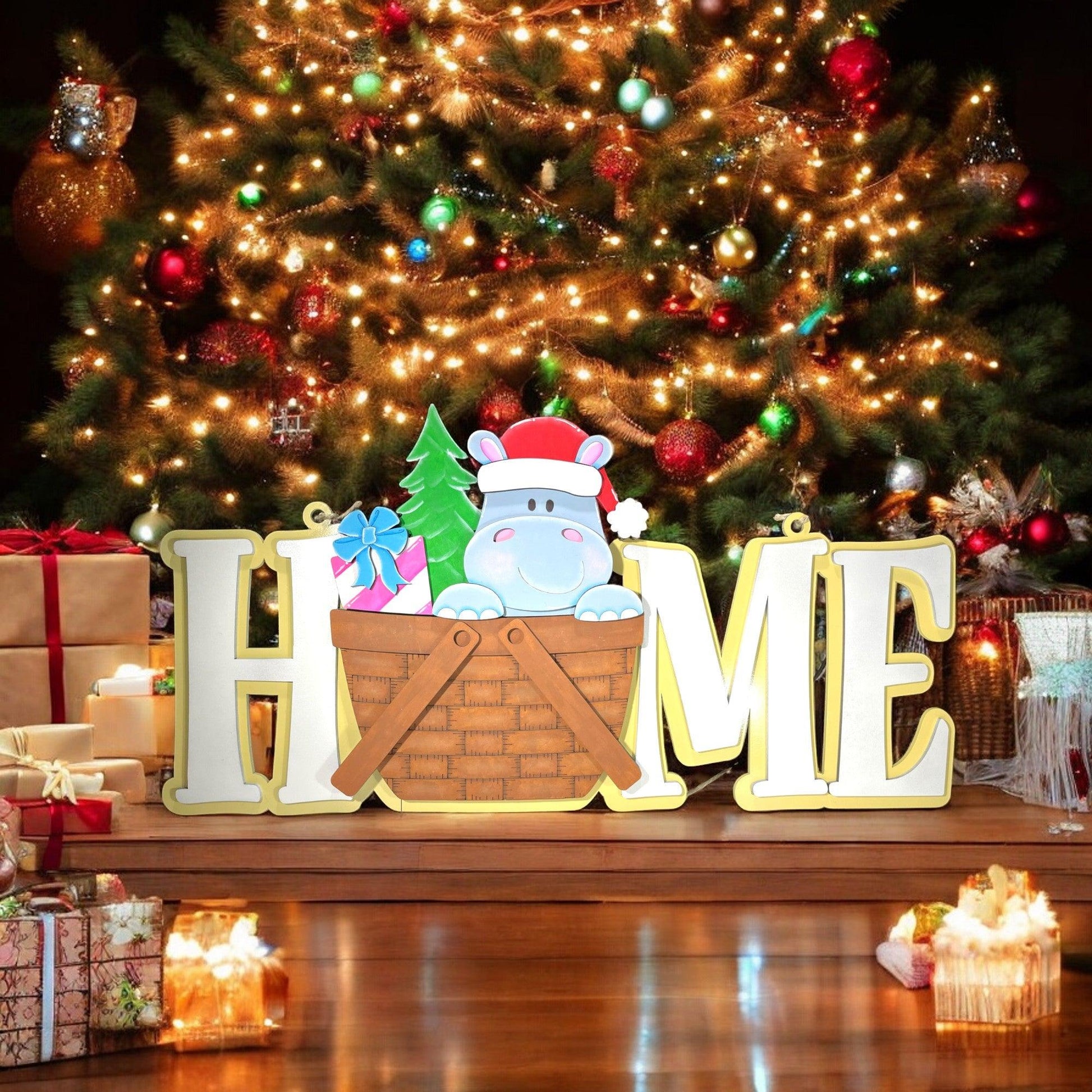 a christmas tree with presents under it and a sign that says home